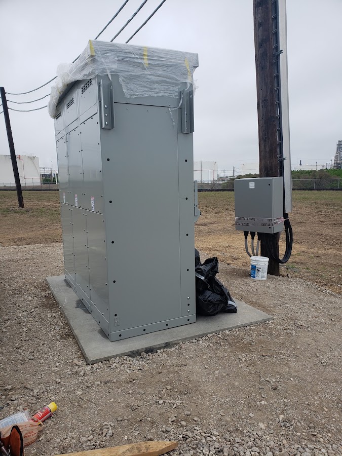 Outdoor industrial switchgear cabinet on a plant site pad
